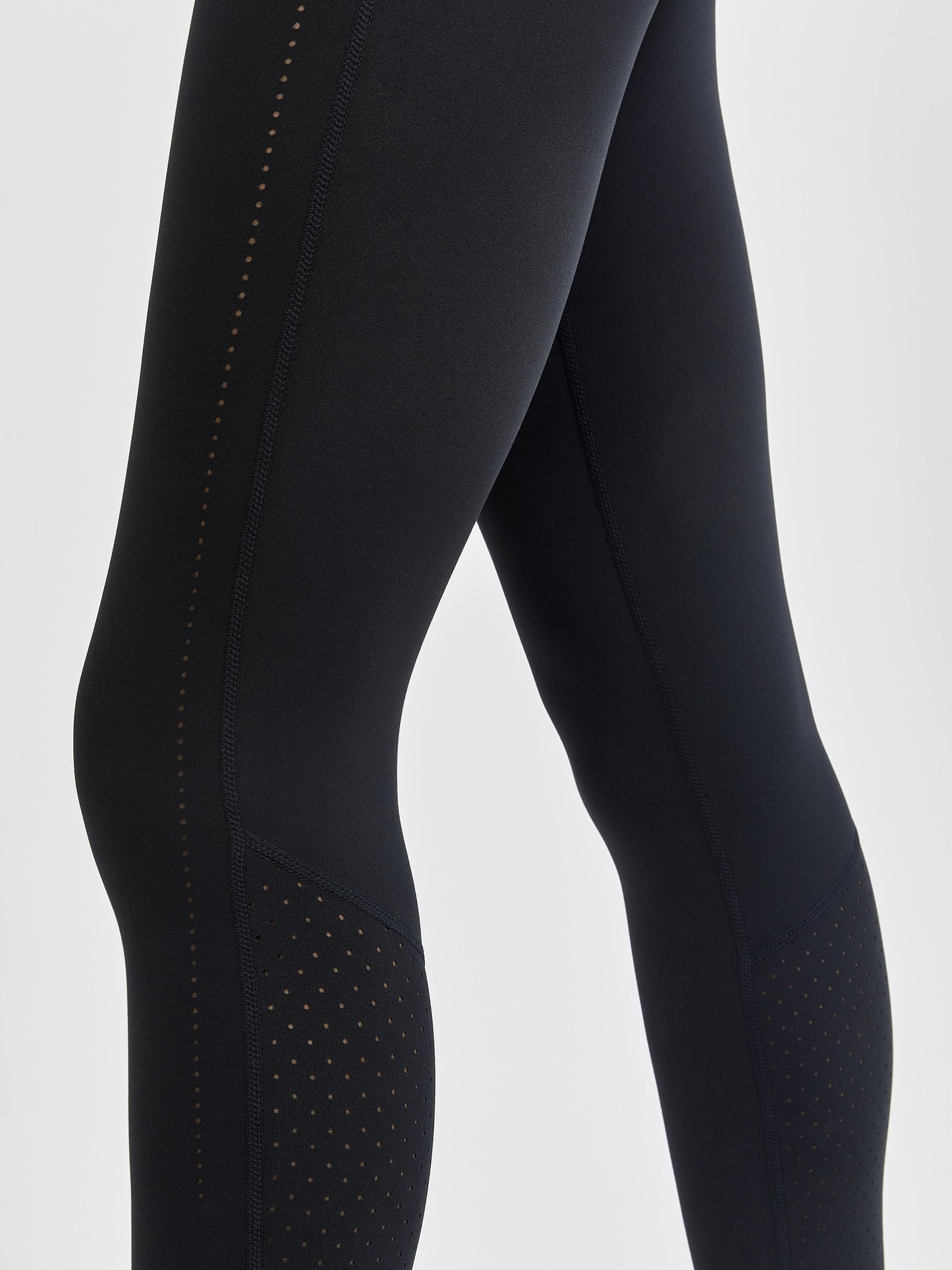 WOMEN'S ADV CHARGE PERFORATED TIGHTS Women's Pants and Tights Craft Sportswear NA